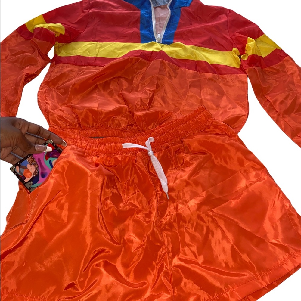 Orange Medium 2 Piece Windbreaker short set.